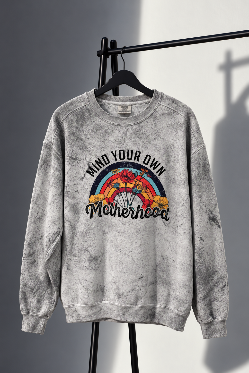 Gray washed Mind Your Own Motherhood sweatshirt with rainbow and wildflowers