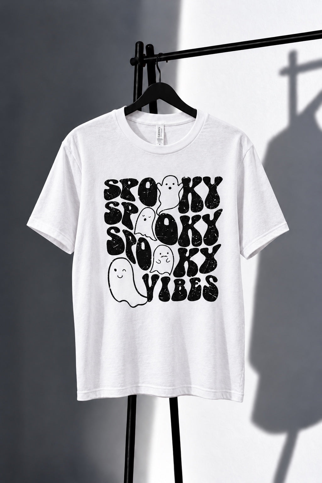 White Spooky Vibes graphic tee with black lettering and cute ghosts